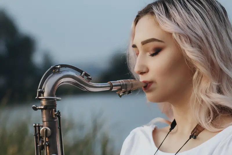 Young woman playing saxophone