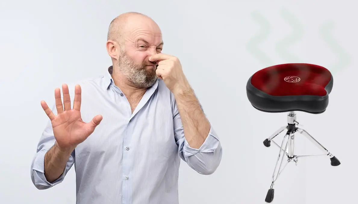 Man holding his nose from stinky drum seat